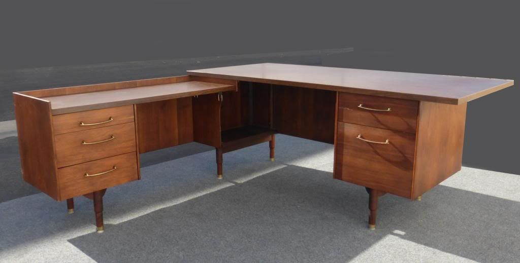 This mid-century modern integrated desk makes other furniture jealous