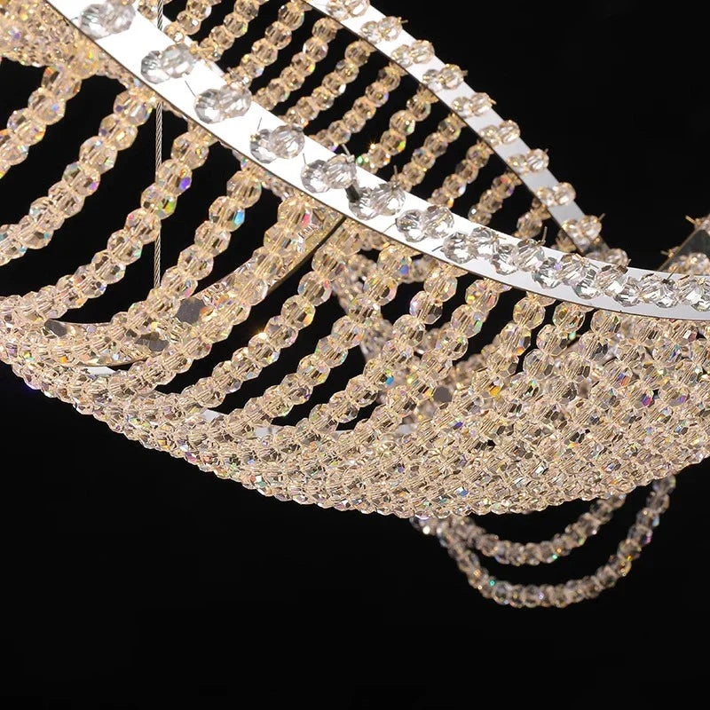 Modern Wave Crystal Chandelier Over Dining Table