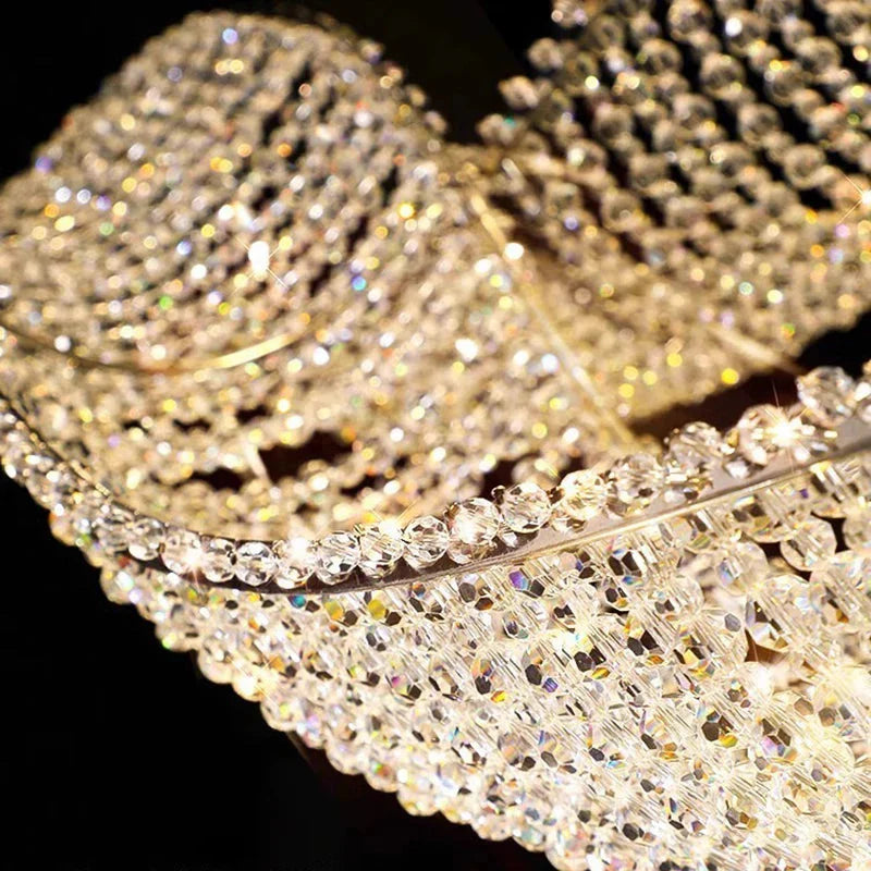 Modern Wave Crystal Chandelier Over Dining Table