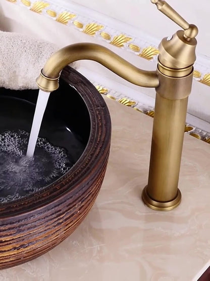 Single-Handled Deck Mount Bathroom Sink Faucet in Antique Brass