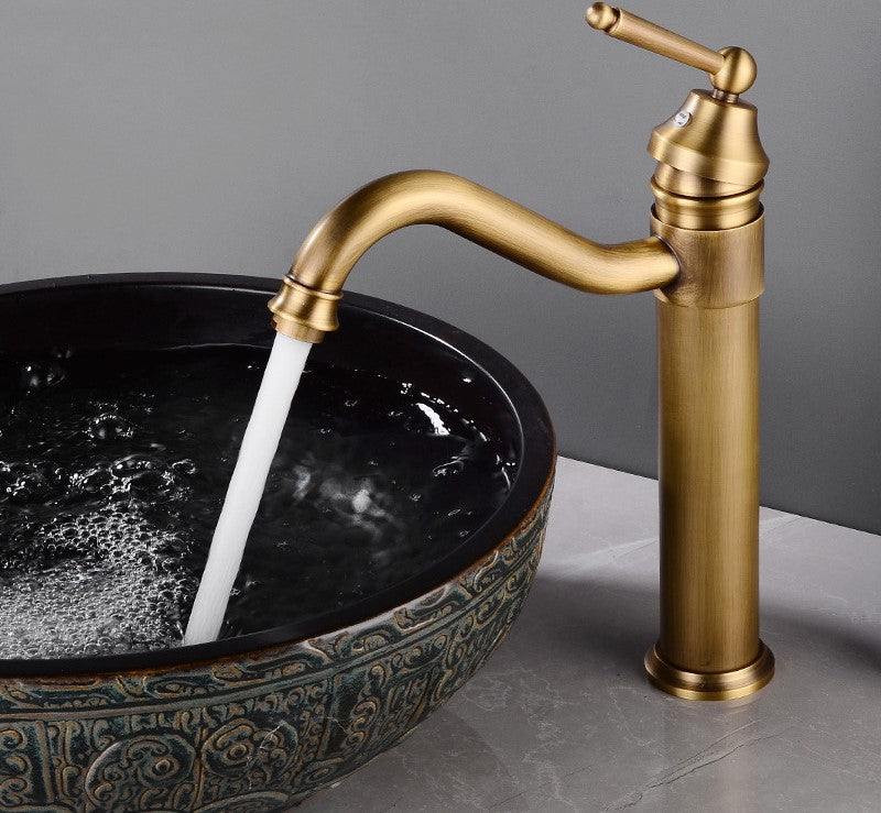 Single-Handled Deck Mount Bathroom Sink Faucet in Antique Brass
